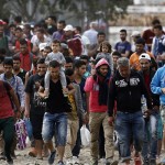 syrian-refugees-walk-towards-greeces-border-with-macedonia-moments-before-crossing-near-the-greek-village-of-idomeni