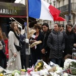 people-mourn-outside-le-petit-cambodge-and-le-carillon-restaurants-as-they-pay-tribute-to-the-victims-of-the-series-of-deadly-attacks-last-friday-in-paris