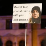 members-of-legida-the-leipzig-arm-of-the-anti-islam-movement-pegida-hold-a-poster-during-a-rally-in-leipzig