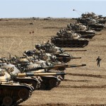 turkish-army-tanks-take-up-position-on-the-turkish-syrian-border-near-the-southeastern-town-of-suruc-in-sanliurfa-province