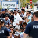 file-photo-of-german-police-officers-standing-in-front-of-migrants-waiting-to-cross-the-border-from-austria-to-germany-near-freilassing