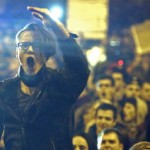 a-demonstrator-shouts-anti-corruption-slogans-during-a-street-protest-in-bucharest