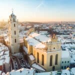 beautiful-vilnius-city-panorama-in-winter-with-snow-covered-houses-chruches-and-streets-aerial-evening-view