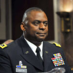 us-army-lt-gen-lloyd-austin-iii-sits-a